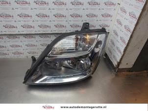 O186598 Gebruikte linker koplamp Renault Megane Scenic