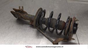 O186599 Gebruikte voorpoot links Volvo V40