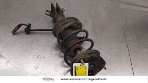 O186611 Gebruikte schokdemperpoot rechts-voor Volvo V40