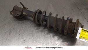 O186633 Gebruikte schokdemperpoot rechts-voor Suzuki Alto
