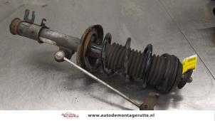 O186634 Gebruikte schokdemperpoot rechts-voor Opel Corsa
