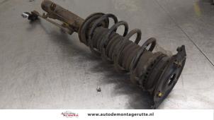 O186636 Gebruikte voorpoot links Mazda 2.