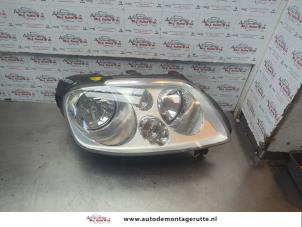 O186800 Gebruikte rechter koplamp Volkswagen Touran