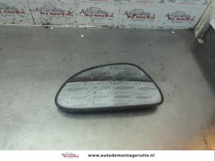 O186816 Gebruikte spiegelglas links Suzuki Alto