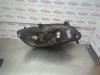 Gebruikte Koplamp links Opel Zafira O186828