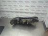 Gebruikte Koplamp links Opel Zafira O186828