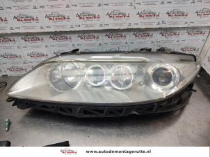 O186933 Gebruikte linker koplamp Mazda 6.