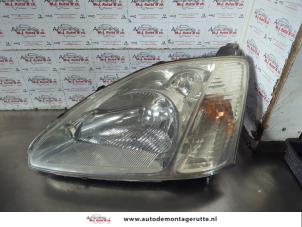 O187302 Gebruikte linker koplamp Honda Civic