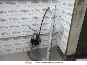 O187506 Gebruikte ruitmechaniek 2deurs links-voor Volkswagen Fox