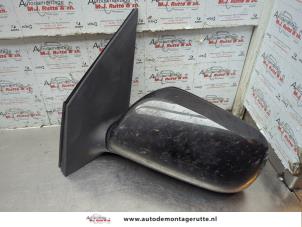 O187520 Gebruikte buitenspiegel links Daihatsu Sirion