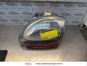 O187543 Gebruikte linker koplamp Fiat Seicento