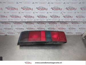 O187675 Gebruikte achterlicht links Ford Escort