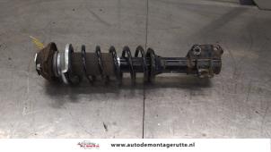 O187898 Gebruikte schokdemperpoot links-voor Suzuki Alto