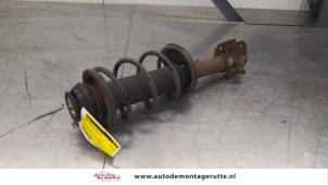 O187902 Gebruikte schokdemperpoot links-voor Suzuki Alto