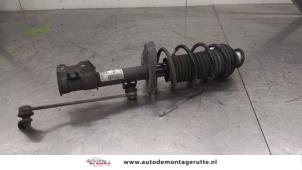 O187903 Gebruikte schokdemperpoot rechts-voor Opel Corsa