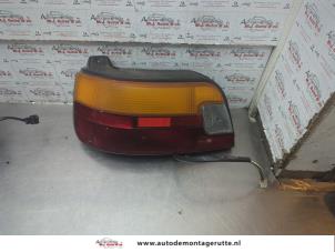 O187993 Gebruikte achterlicht links Toyota Starlet