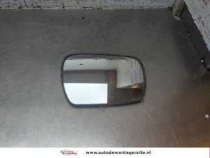 O187996 Gebruikte spiegelglas links Toyota Starlet