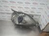 Gebruikte Koplamp links Toyota Yaris O188013