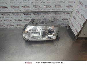 O188231 Gebruikte linker koplamp Alfa Romeo 145/146