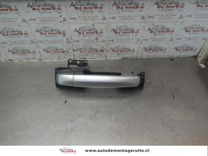 O188525 Gebruikte portiergreep 4deurs rechts-voor Opel Agila