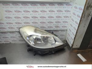 O188530 Gebruikte rechter koplamp Renault Clio
