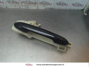 O188580 Gebruikte deurgreep 4deurs rechts-achter Kia Rio
