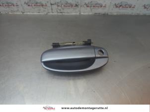 O188634 Gebruikte portiergreep 4deurs links-voor Chevrolet Kalos