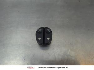 O188785 Gebruikte schakelaar elektrisch raam Ford Fiesta