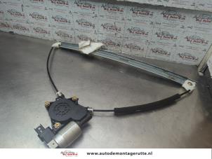 O188882 Gebruikte ruitmechaniek 4deurs rechts-voor Mazda 5.