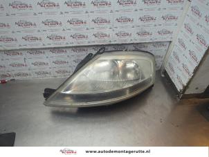 O188919 Gebruikte koplamp links Citroen C3