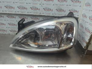 O189038 Gebruikte linker koplamp Opel Combo