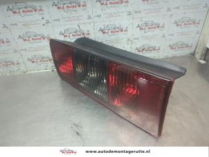 O189041 Gebruikte achterlicht links Opel Combo