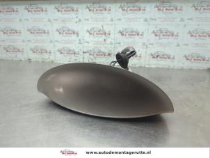 O189084 Gebruikte handgreep achterklep Nissan Micra
