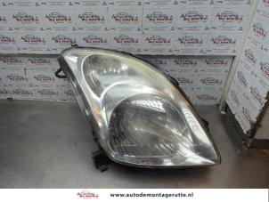 O189256 Gebruikte koplamp rechts Suzuki Swift