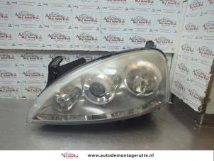 O189281 Gebruikte linker koplamp Opel Corsa