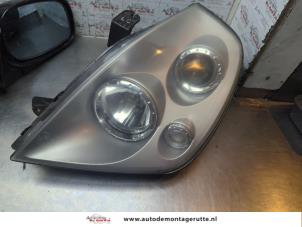 O189521 Gebruikte linker koplamp Ssang Yong Rexton