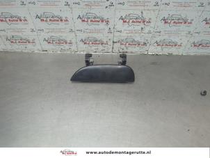 O189605 Gebruikte portiergreep 4deurs links-voor Daihatsu Cuore