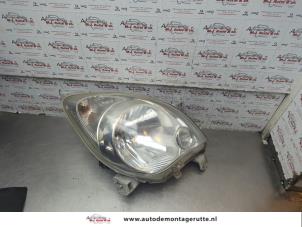 O189625 Gebruikte rechter koplamp Daihatsu Cuore
