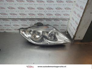 O189711 Gebruikte rechter koplamp Seat Exeo
