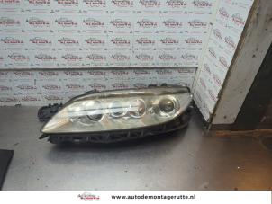O189783 Gebruikte linker koplamp Mazda 6.