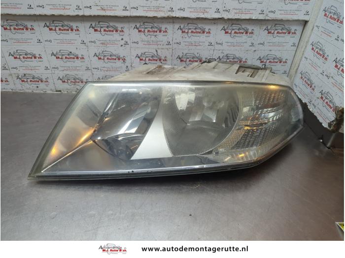 Gebruikte Koplamp links Skoda Octavia O189939