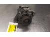 Dynamo van een Daihatsu Cuore (L701), 1998 / 2003 1.0 12V, Hatchback, Benzine, 989cc, 40kW (54pk), FWD, EJDE, 1998-11 / 2000-09, L701 2000