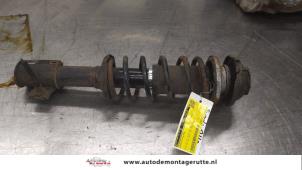 O190207 Gebruikte schokdemperpoot links-voor Suzuki Alto