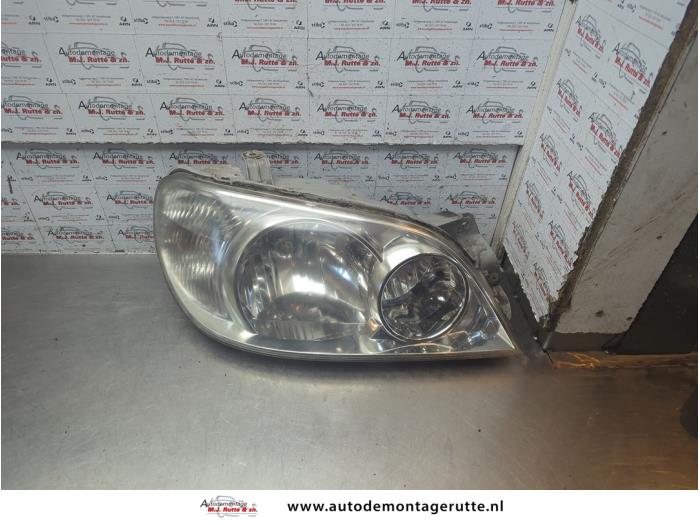 Gebruikte Koplamp rechts Kia Carnival O190388