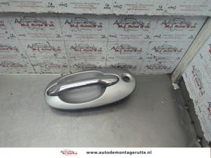 O190389 Gebruikte portiergreep 4deurs rechts-voor Kia Carnival