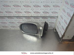O190390 Gebruikte buitenspiegel links Kia Carnival