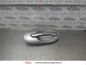 O190394 Gebruikte deurgreep 4deurs rechts-achter Kia Carnival