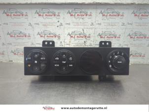 O190405 Gebruikte chaufage bedieningspaneel Kia Carnival
