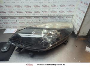 O190580 Gebruikte linker koplamp Renault Grand Scenic