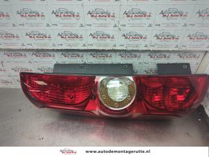 O190587 Gebruikte achterlicht links Opel Combo